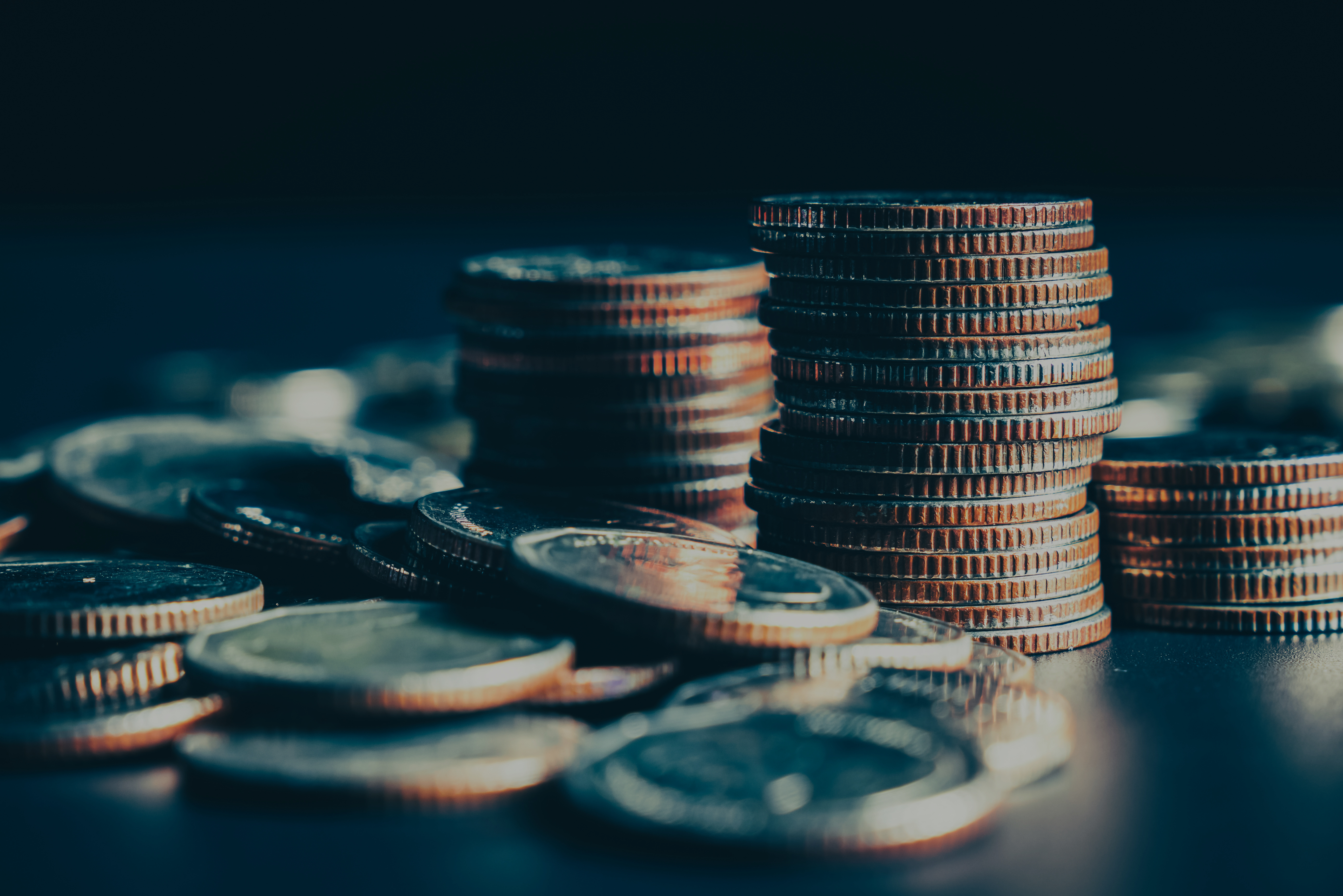 Pile of gold coins money stack in finance treasury deposit bank account saving . Concept of corporate business economy and financial growth by investment in valuable asset to gain cash revenue .
