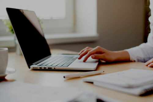 Writer using a laptop